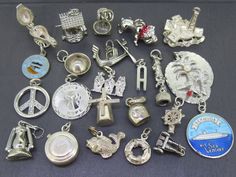 Choice of vintage sterling silver (previously worn) charm for charm bracelets. A variety of sizes and conditions so please view photos and ask any questions if needed though they all have age related wear and/or patina, pictures tell the best story. They are all either marked or tested and guaranteed sterling silver if unmarked.  Jump rings may or may not be sterling silver depending on if they are replacements.  The complimentary jump rings I include are not sterling but a stronger metal. Great Vintage Sterling Silver Charm Bracelet For Jewelry Making, Vintage Silver Charms With 17 Jewels, Antique Silver Charms With Lobster Clasp, Hallmarked Silver Jewelry For Collecting, Antique Silver Charms For Jewelry Making, Silver Jewelry Charms For Collecting, Oil Derrick, Kitchen Stand Mixer, Three Wise Monkeys