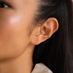 Our Claw Hoop Ear Cuff is a graceful, yet edgy interpretation of a classic ear cuff. This dainty and minimalistic piece can be worn alone or stacked with other earrings for additional style. Material: High Quality Solid 925 Sterling Silver Finish: Sterling Silver ∙ 18K Gold Featuring 9.5mm Inner and 12.5mm Outer Cuff Earrings Sold as a pair SKU: RR-ER274 Ear Cuffs, Cuff Earrings, Solid 925 Sterling Silver, Ring Necklace, Ear Cuff, 18k Gold, 925 Sterling Silver, Cuff, Sterling Silver