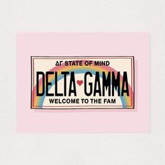 a pink sticker with the words delta gama welcome to the fam