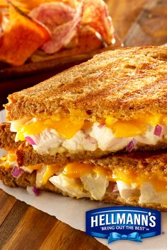 a grilled cheese sandwich with ham and onions