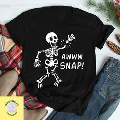 Product details: ✔️ NAME: Skeleton Awww Snap T-Shirt, Funny Skeleton Shirt, Skeleton Vintage Shirt, Halloween Shirt, Halloween Skeleton Shirt, Funny Halloween Shirt ✔️ IMPORTANT NOTE: Both Men and Women can we our shirts because this is unisex style t-shirts;  Wash item inside out in cold water, do not bleach, do not dry clean, do not iron directly on the design. ✔️ MATERIAL: 5.3-ounce, 100% cotton (99/1 cotton/poly (Ash) & 90/10 cotton/poly (Sport Grey); Heavyweight classic unisex tee; Taped neck and shoulders; Tearaway label; Decoration type: Digital Print ✔️ OUR DESIGN PRODUCTS: Each One are designed and sold in limited quantities. The designs are created by our incredibly talented in house graphic art team who often hand draw and illustrate each Tee shirt design. ✔️ SIZE CHART: Please Skeleton Vintage, Recovery Shirts, Broken Arm, Funny Skeleton, Skeleton Shirt, Halloween Skeleton, Tee Shirt Designs, Vintage Shirt, Unisex Style