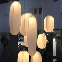 a group of lights hanging from the ceiling