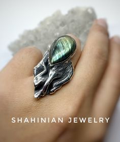 Handmade silver ring with natural rainbow labradorite. This ring  can be an excellent gift for you and your loved ones) the ring size is adjustable so you can give it as a present without knowing the size of the finger) Made in Armenia by Shahinian Jewelry. All our pieces of jewelry are made of high-quality silver and have stamp 925 【FULL DETAILS】 ▶Gemstone: Natural labradorite (please note that the stones can vary from the one shown here)  ▶RING  SIZE: adjustable (choose from the option) ▶ Ring weight: approx. 24 gr ▶Earrings weight: approx.16 gr 1 inch = 25.4 mm 1 pound = 453.6 grams ⦿ Attention: The color of the stones may differ due to a difference between  monitors ◦* ◦* ◦* ◦* ◦* ◦* ◦* ◦* ◦* ◦* ◦* ◦*  ✔️ Please, view my store policies before buying this item here. https://www.etsy.com Unique Teardrop Ring With Natural Stones, Mystical Labradorite Ring Jewelry, Unique Labradorite Ring Jewelry, Green Labradorite Teardrop Jewelry, Green Labradorite Ring, Deer Rings, Unusual Rings, Druzy Crystal, Animal Rings