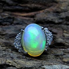 925 Silver Ethiopian Opal Ring,Natural Welo Fire Opal Ring,Handmade Ring,Party Wear Ring,Engagement Ring,Minimalist Ring,Ring For Women Material:- Gemstone Gemstone - Natural Opal Gemstone Stone Shape - Oval Metal - 925 Sterling Silver Gemstone Color - Multi Condition - Very Good Origin - INDIA Custom Order-: I Gladly Accept Custom Order In Many Types Of Stones Different Shapes & Quality In Lower To Higher And Higher To Lower Prices. 100% Genuine & Natural. *Measurements And Weights Are Luxury Ethiopian Opal Multi-stone Rings, Luxury Multi-stone Ethiopian Opal Rings, Luxury Silver Ethiopian Opal Ring, Engagement Ring Minimalist, Rough Jewelry, Ethiopian Opal Ring, Minimalist Engagement Ring, Zierlicher Ring, Fire Opal Ring