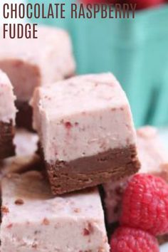 chocolate raspberry fudge brownies on a plate with raspberries