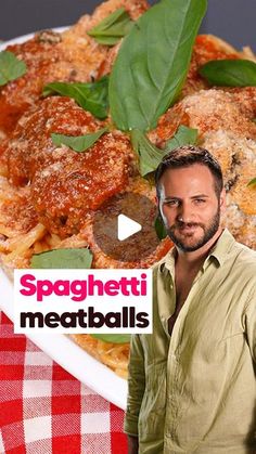 a man standing in front of a plate of spaghetti and meatballs