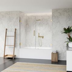 a bathroom with marble walls and flooring next to a bathtub in the corner