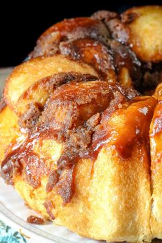 a bundt cake on a plate with caramel sauce