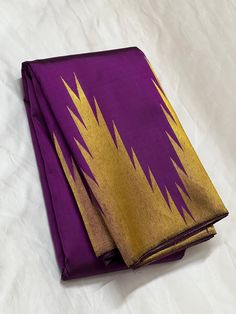 Bridal Collection Temple Border Purple Color Pure Kanchipuram Silk Saree | Indian Traditional Ethnic Saree | Wedding or Party Wear Saree | Handwoven Gift Saree for Her Product Details : Saree Type : Pure Kanchipuram Silk Saree Golden Zari, Silk Mark Certified Blouse Piece : Yes (Un-Stitched) Saree Length : 5.5 Meters Blouse Piece Length : 80 cm Saree Weight : 0.9 kg Saree Fabric : Pure Kanchipuram Silk  Color : As shown in the picture Work : weaving Pattern : designer Occasion: Party Wear, Forma Ceremonial Purple Saree With Zari Work, Traditional Purple Ceremonial Wear, Ceremonial Purple Saree For Diwali, Festive Ceremonial Purple Dupatta, Ceremonial Blouse Piece In Gold With Self Design, Ceremonial Gold Blouse Piece With Motifs, Ceremonial Gold Blouse Piece With Self Design, Ceremonial Purple Dupatta With Cutdana, Gold Tussar Silk Churidar For Festivals