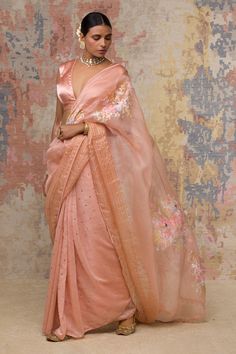 Blush saree with hand-painted motifs, striped detail and Chanderi mukaish panel. Paired with gajji V-neck blouse.
Component: 2
Embroidered
Neckline: V neck
Sleeve Length: Sleeveless
Fabric: Silk Organza, Gajji, Chanderi Muskaish
Color: Peach
Back tassel tie-up
Chanderi mukaish work - Aza Fashions Organza Saree With Blouse, India Traditional Dress, Pink Organza Saree, Half And Half Saree, Painted Saree, Peach Saree, Hand Painted Sarees, Lehenga Blouse, Half And Half