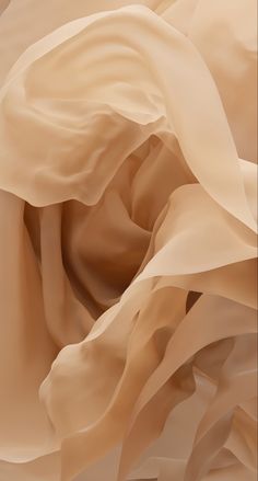 the fabric is flowing in the wind and it looks like something out of an abstract painting