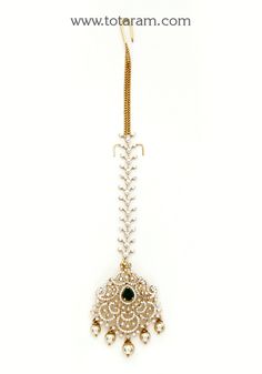 18 karat gold "detachable" diamond maang tikka cum pendant - papidi billa with color stones & south sea pearls
  this product can be used as pendant.
  this product has inter changeable stones in the pendant. 
  gross weight of the pendant without chain : 11.400 grams
  pendant diamond weight :1.16 carats
  number of diamonds in the pendant : 238 pcs
  gross weight of the diamond tikka chain without pendant : 4.750 grams
  tikka chain diamond weight : 0.53 carats
  number of diamonds in the tikk Elegant Zari Work Jewelry For Reception, Elegant Jewelry With Zari Work For Reception, Elegant Gold Tikka With Zari Work, Elegant Ceremonial Tikka With Zari Work, Elegant Tilla Tikka For Reception, Gold Cutdana Tikka For Reception, Gold Stone Work Tikka For Formal Occasions, Elegant Gold Tikka For Reception, Formal Gold Tikka With Stone Work