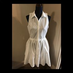 White Armani Exchange Tapered Waist, Pleated Dress. Never Worn, Tags Still Attached. Dress Is A Size 10, But A Small 10. The Waist Measures About A 30, But It’s No Give. Classic White A-line Shirt Dress, Classic White Dress For Day Out, Classic White Mini Dress For Daywear, Sleeveless White Shirt Dress For Work, White Sleeveless Shirt Dress For Work, White Sleeveless Shirt Dress For Daywear, White Sleeveless Shirt Dress For Casual Wear, Fitted Midi Length Shirt Dress For Daytime, White Knee-length Shirt Dress For Dress Down