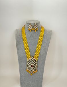 Yellow Kundan Long Peacock Necklace Indian Jewelry/Long Polki Necklace/Indian Long Necklace/Pakistani Jewelry/Kundan Long Necklace Mala Length 20 inches and adjustable with golden thread  Color, shades, texture displayed may slightly vary from the actual product due to digital image limitations. We request you to consider these minor variations. Please expect the possibility of some slight imperfections when buying handmade jewelry. Please let me know if you have any questions. Arrives in a gift box. Thank you so much for visiting my shop. Heavy Kundan Beaded Necklaces For Festivals, Traditional Kundan Necklace With Peacock Design For Puja, Traditional Heavy Chandbali Beaded Necklaces, Traditional Beaded Kundan Chandbali Necklace, Traditional Kundan Necklace With Peacock Design For Celebration, Yellow Necklaces For Festive Occasions, Kundan Beaded Chandbali Necklaces, Kundan Chandbali Beaded Necklaces For Festivals, Traditional Kundan Necklace With Peacock Design For Festivals