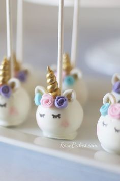 unicorn cake pops with pastel watercolors on them