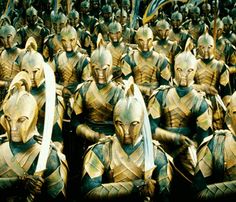 a large group of people dressed in armor