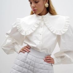 Ashley Blouse Material: COTTONSize: S,M,L Size Chart, cm Size Length Bust Shoulder Waist Sleeve Length S 64 96 34 96 68 M 65 100 35 100 69 L 66 104 36 104 70 Size Chart, INCH Size Length Bust Shoulder Waist Sleeve Length S 25.20 37.80 13.39 37.80 26.77 M 25.59 39.37 13.78 39.37 27.17 L 25.98 40.94 14.17 40.94 27.56 Due to different batches, a liner may be different. We pay your attention to the fact that different computer screens can display different colors even though this is one and the same Ruffle Collar Blouse, Fit Clothes, Peter Pan Collar Blouse, Puff Sleeve Shirt, Fits Clothes, White Long Sleeve Shirt, Ruffled Collar, Blouse Material, 가을 패션