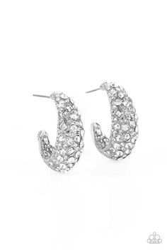 Featuring a beveled surface, a thick hammered silver hoop is haphazardly encrusted in round and square white rhinestones for a glamorously glittery finish. Earring attaches to a standard post fitting. Hoop measures approximately 3/4" in diameter.

 Sold as one pair of hoop earrings. White Hoop Earrings, Paparazzi Accessories, White Rhinestone, Affordable Jewelry, Paparazzi Jewelry, White Earrings, Hammered Silver, Gold Hoop, Silver Hoops