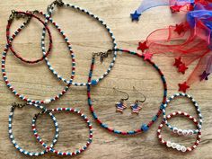 Check out all of my cute 4th of July styled jewelry pieces!  There are three different necklaces to choose from, and four anklets.  There are also a small pair of flag star earrings, and my beaded WWJD bracelets in patriotic colors. - The July Choker - 13" w/ a 2.5" extender chain - The Americana Babe Choker - 13" w/ 2.5" extender chain - The Waterfall Choker - 13" w/ a 2.5" extender chain - The July Anklet - 8.5" w/ 1" extender chain - The Americana Babe Anklet w/ 1" extender chain - The Waterf Adjustable Colorful Beaded Jewelry For 4th Of July, Patriotic Nickel-free Jewelry For 4th Of July, Multicolor Round Beads Jewelry For Independence Day, Blue Jewelry For Independence Day Gift, Patriotic Adjustable Colorful Beads Jewelry, Patriotic Adjustable Jewelry For Independence Day, Adjustable Multicolor Jewelry For Independence Day, Adjustable Patriotic Jewelry With Colorful Beads, Adjustable Patriotic Jewelry For Independence Day