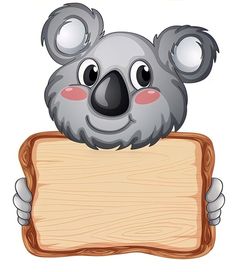 a koala bear holding a wooden sign