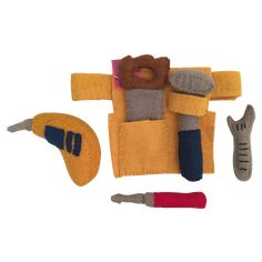 a stuffed toy with tools on it sitting next to a pair of scissors and an object