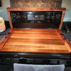 an old fashioned oven with wooden counter tops