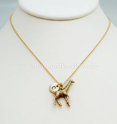 "❖ Large Giraffe charm in Antique Gold Pewter. Approx: 1 X 6/8\" Lead free pewter charm made in U.S.A. ❖ Hand Stamped Initial Charm - Antique Gold Pewter 3/8\" (9mm) ❖ Click below for Large giraffe in Antique Silver Pewter: https://www.etsy.com/listing/127924871 ❖ Add a birthstone or Freshwater pearl for $3.50 https://www.etsy.com/listing/110444872 ❖ Additional Hand Stamped Initial Charms $4.50 each: https://www.etsy.com/listing/107021419 ❖ Go back to Short and Bald Jewelry http://www.etsy.com/s Personalized Hypoallergenic Gold Charm Necklace, Gold Hypoallergenic Charm Necklace For Personalized Gift, Adjustable Hand Stamped Gold Charm Necklaces, Adjustable Gold Hand Stamped Charm Necklaces, Adjustable Hypoallergenic Initial Pendant Charm Necklaces, Personalized Gold Brass Charm Necklaces, Personalized Gold Charm Necklaces In Brass, Gold Hand Stamped Charm Necklace For Birthday, Gold Personalized Initial Necklace Adjustable