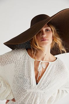 Stay away from the rays in this oversized straw hat, featuring a large, floppy brim perfect for all-day lounging by the pool or beach. * Lightweight * Packable, unstructured design | Shady Character Packable Wide Brim Hat by Free People in Brown Floppy Hat Outfit Summer, Floppy Hat Outfit, Packable Sun Hat, Oversized Hat, Packable Hat, Wide Brim Straw Hat, Flat Hats, Wide Brim Sun Hat, Free People Store