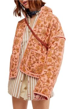 A quilted, boho-inspired jacket features a slouchy silhouette with a vibrant floral print and defined piping for a unique cold-weather look. 25" length (size Medium) Front hook-and-eye closure Stand collar Drop-in pockets Lined, with polyester fill 100% cotton Dry clean or machine wash, tumble dry Imported Chloe Jacket, Floral Print Jacket, Patchwork Jacket, Fall Winter Wardrobe, Print Jacket, High Collar