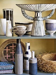 various vases and bowls on shelves in a room