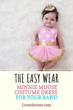 a baby girl wearing a pink and gold polka dot dress with the words, the easy wear minnie mouse costume dress for your baby