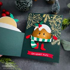 an open christmas card with a ginger on it