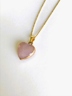 "I once had a thousand desires, but in my one desire to know you, all else melted away." - Rumi This rose quartz necklace is the perfect gift for birthday or just to say "I love you." This rose quartz necklace is an excellent gift idea for yourself or loved one. It is made of natural rose quartz, which has the healing properties of joy, abundance, love, and also energy. The chain is 18K gold plated over silver 925 and the charm is rose quartz and 18k gold plated over brass. Chain length 45 cm. C Rose Gold Pendant Crystal Necklace For Gift, Rose Gold Crystal Pendant Necklace Gift, Dainty Gemstone Heart Pendant Necklace, Gold Crystal Necklace For Valentine's Day Gift, Elegant Rose Quartz Necklace Gift, Valentine's Day Gold Crystal Necklace Gift, Valentine's Day Gift Gold Crystal Necklace, Pink Heart Gemstone Pendant Necklace, Pink Gemstone Heart Necklace