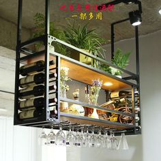 a wine rack filled with lots of bottles and glasses