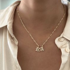 Elevate your style with our Everyday Old English Initial Necklace, featuring sparkling cubic zirconia details. This piece adds a touch of elegance and personalization to your daily look. Choose single or double letters—up to 2 letters only. Choose between 3 different types of chains and lengths. Why You'll Love It: Versatile Design: Perfect for wearing solo or layering with other necklaces for a trendy look. Timeless Elegance: The classic Old English font combined with sparkling cubic zirconia c Everyday Gold Diamond Initial Necklace, Everyday Personalized Cubic Zirconia Necklaces, Personalized Diamond Initial Necklace For Everyday, Everyday Cubic Zirconia Initial Pendant Necklace, Elegant Cubic Zirconia Initial Necklace Gift, Diamond Monogram Initial Necklace As Gift, Everyday Initial Necklace With Diamond Accents, Everyday Diamond Initial Necklace, Gold Initial Necklace In Cubic Zirconia