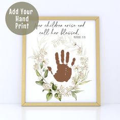 a hand print with flowers and leaves on it