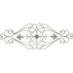 an ornate metal wall decoration on a white background