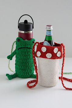 two crocheted items are sitting next to each other