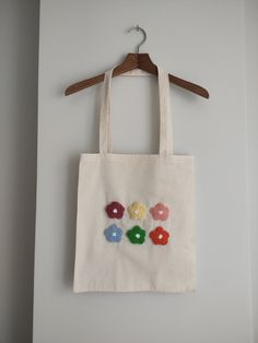 Eco-friendly cloth bag is produced from 210 gr cloth fabric. The bag measures 35×40. It is 100% cotton. The handle of the bag is 70 cm long, and when it is attached to the arm, it becomes 35 cm. Spring Beige Cotton Canvas Bag, Handmade Cotton Bags For Spring, Multicolor Cotton Canvas Tote Bag, Handmade Casual Cotton Canvas Bag, Spring Handmade Cotton Bags, Handmade Cotton Canvas Tote Bag, Handmade Beige Cotton Canvas Bag, Punch Bag, Gardening Outfit