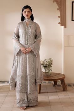 Brand: Serene PremiumProduct Code: S-1079 LumeireCollection: Serene Premium Embroidered Muse Luxury Chiffon CollectionFabric: Chiffon DESIGN DETAILS: Embroidered Chiffon Front Embroidered & Hand Embellished Neck Border Embroidered Chiffon Back Embroidered Organza Front Back Border Embroidered Chiffon Sleeves Embroidered Organza Sleeves Border Embroidered Chiffon Dupatta Dyed Raw-silk Trousers Embroidered Organza Trousers Border DISCLAIMER:* Lining, Laces, and Tassels are not included in unstitched variants.* Embellishment items in stitched outfits are subject to market availability.* The actual colors of the outfit may vary from the colors being displayed on your device. CARE INSTRUCTIONS: Extra Fabric Has Been Used For Shoot Original Color May Vary Slightly From The Picture Dry Clean Reco Organza Trousers, Shadi Dress, Batik Print Dress, Lehenga Jewellery, Shadi Dresses, Saree Sale, Chiffon Sleeves, Organza Sleeves, Lehenga Style