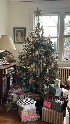 a decorated christmas tree in a living room