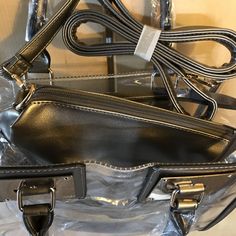 This satchel and tote handbag is 2-in-1. It's a transparent satchel tote with a complimentary removable shoulder bag. This bag is awesome! If you love chic bags, this is the perfect bag for you!

2-day processing. Shipped in 4-7 days. Chic Bags, Beaded Clutch, Satchel Tote, Tote Handbag, Perfect Bag, Print Tote, If You Love, Bag Tags, Tote Handbags