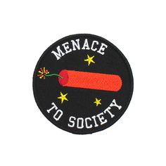 a badge that says menace to society with a carrot on the front and stars around it