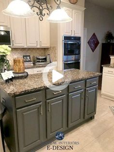 a kitchen with white cabinets and granite counter tops