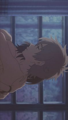 an anime character is laying down in front of a window