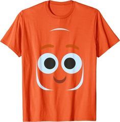 an orange t - shirt with a smiling face