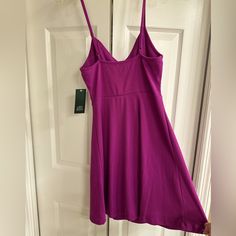 Cute Plum Purple Sleeveless Mini Dress With Ribbed Texture, Sweetheart V-Neckline And Soft Molded Cups. Made Of Stretchy Fabric. Casual V-neck Dress With Built-in Bra, Purple Stretch Dress With Spaghetti Straps, Purple Stretch Spaghetti Strap Dresses, Stretch Purple Dresses With Spaghetti Straps, Casual V-neck Sleeveless Dress For Date Night, V-neck Sleeveless Sundress For Date Night, Sleeveless V-neck Sundress For Date Night, Purple Sleeveless V-neck Dress For Spring, Stretch V-neck Lined Mini Dress