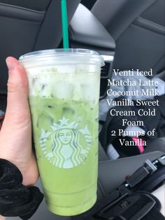 a person holding up a green drink in their hand with the words, venti iced matcha latte coconut milk vanilla sweet cream cold