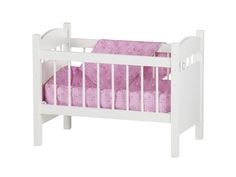 a small white crib with pink sheets on the bottom and bottom rails, in front of a white background