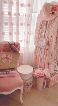 a room filled with lots of pink furniture and accessories